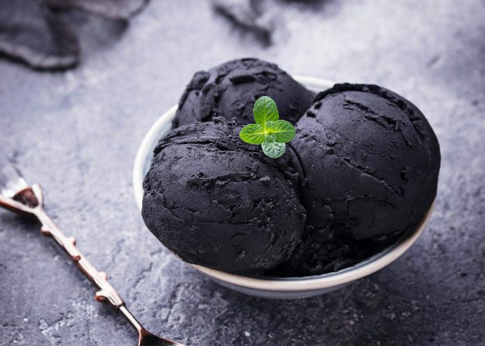 Black ice cream. Trendy food